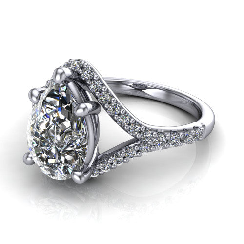 Clementine pear classic engagement ring in Platinum, three-quarter perspective showing the prong-set center above a pav&eacute; bypass split shank
