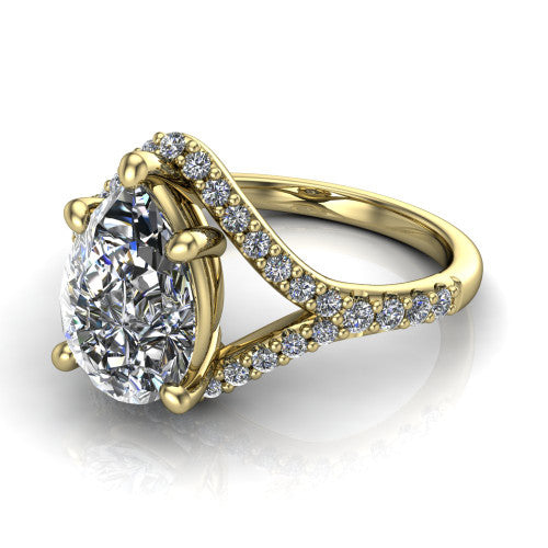 Clementine pear classic engagement ring in 18K Yellow Gold, three-quarter perspective showing the prong-set center above a pav&eacute; bypass split shank