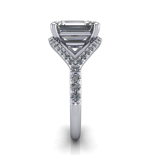 Clementine emerald classic engagement ring in Platinum, side profile showing the pav&eacute; split shank crossing in a bypass beneath the center