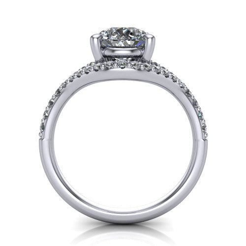 Clementine pear classic engagement ring in Platinum, through-finger front profile showing the raised center above the pav&eacute; split band