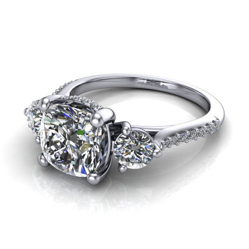 Phoebe cushion hidden halo engagement ring in 14K White Gold, three-quarter perspective showing the center diamond between two round side stones above a pav&eacute; shank
