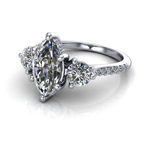 Phoebe marquise hidden halo engagement ring in Platinum, three-quarter perspective showing the center diamond between two round side stones above a pav&eacute; shank