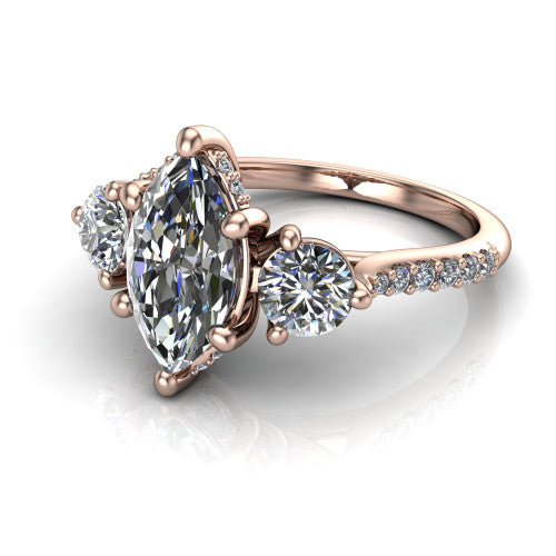 Phoebe marquise hidden halo engagement ring in 18K Rose Gold, three-quarter perspective showing the center diamond between two round side stones above a pav&eacute; shank