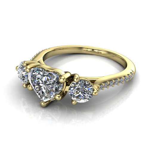 Phoebe heart hidden halo engagement ring in 14K Yellow Gold, three-quarter perspective showing the center diamond between two round side stones above a pav&eacute; shank