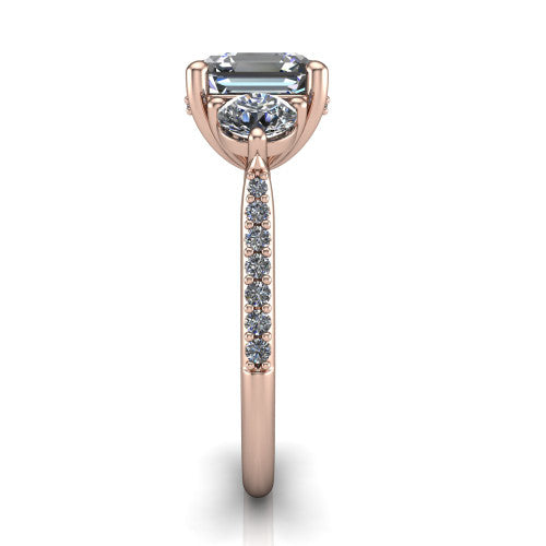 Phoebe asscher hidden halo engagement ring in 18K Rose Gold, side profile showing the hidden halo beneath the center and the pav&eacute; diamonds down the shank