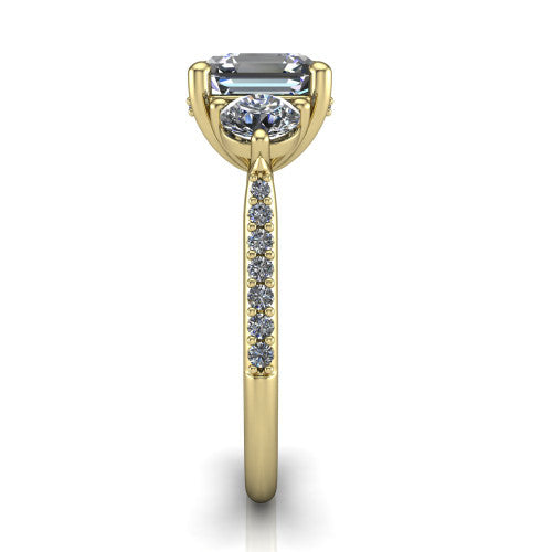 Phoebe asscher hidden halo engagement ring in 18K Yellow Gold, side profile showing the hidden halo beneath the center and the pav&eacute; diamonds down the shank