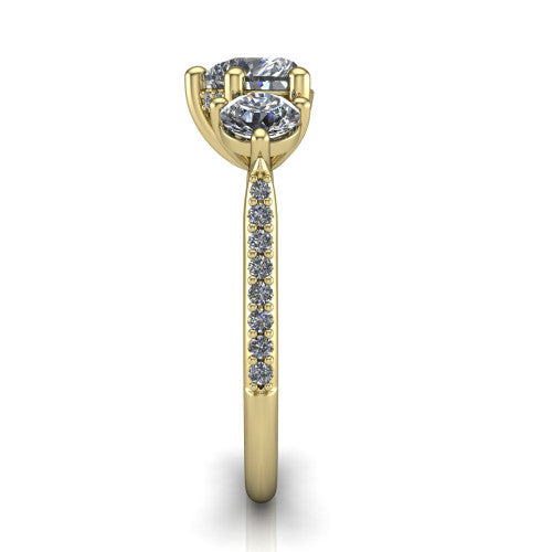 Phoebe heart hidden halo engagement ring in 14K Yellow Gold, side profile showing the hidden halo beneath the center and the pav&eacute; diamonds down the shank