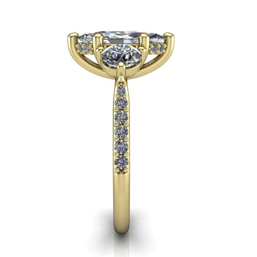 Phoebe marquise hidden halo engagement ring in 14K Yellow Gold, side profile showing the hidden halo beneath the center and the pav&eacute; diamonds down the shank