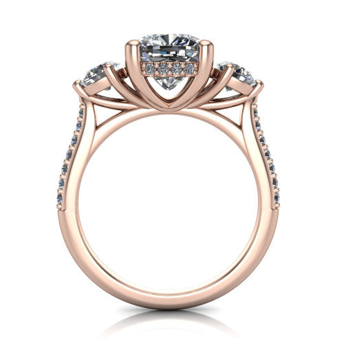 Phoebe cushion hidden halo engagement ring in 18K Rose Gold, through-finger front profile showing the three-stone head raised above the pav&eacute; band