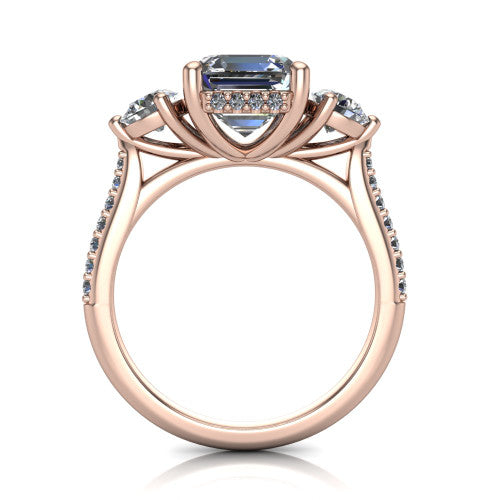 Phoebe asscher hidden halo engagement ring in 18K Rose Gold, through-finger front profile showing the three-stone head raised above the pav&eacute; band