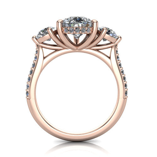 Phoebe pear hidden halo engagement ring in 18K Rose Gold, through-finger front profile showing the three-stone head raised above the pav&eacute; band