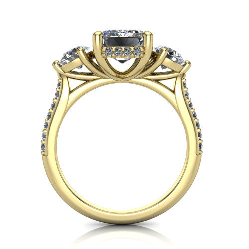 Phoebe emerald hidden halo engagement ring in 18K Yellow Gold, through-finger front profile showing the three-stone head raised above the pav&eacute; band