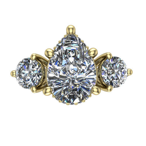 Phoebe pear hidden halo engagement ring in 18K Yellow Gold, top-down view showing the center diamond flanked by two round side stones over a hidden halo