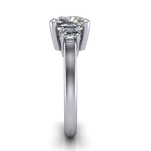 Imogen cushion three stone engagement ring in 14K White Gold, side profile showing the round side stone and the smooth tapered polished band
