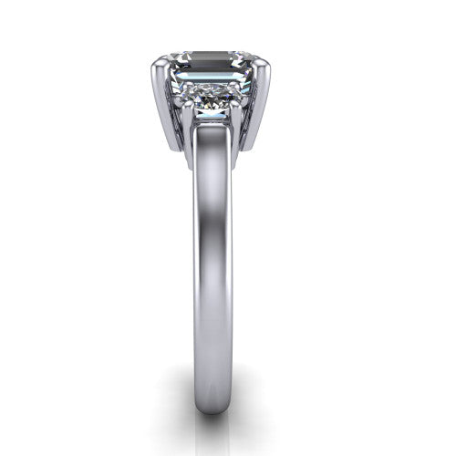 Imogen asscher three stone engagement ring in Platinum, side profile showing the round side stone and the smooth tapered polished band