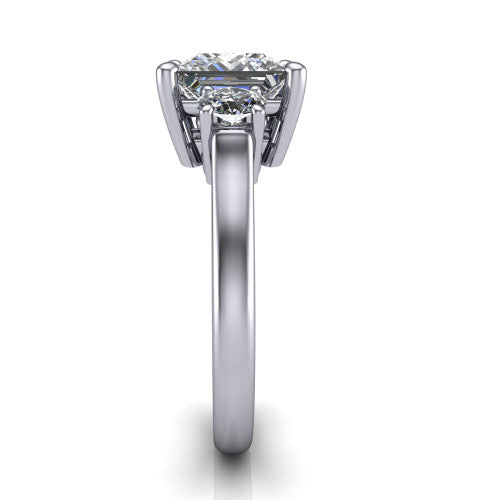 Imogen princess three stone engagement ring in 18K White Gold, side profile showing the round side stone and the smooth tapered polished band