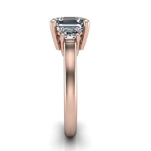 Imogen asscher three stone engagement ring in 18K Rose Gold, side profile showing the round side stone and the smooth tapered polished band