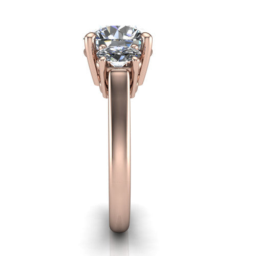 Imogen round three stone engagement ring in 14K Rose Gold, through-finger front profile showing the three-stone head raised above the slim polished shank and trellis gallery