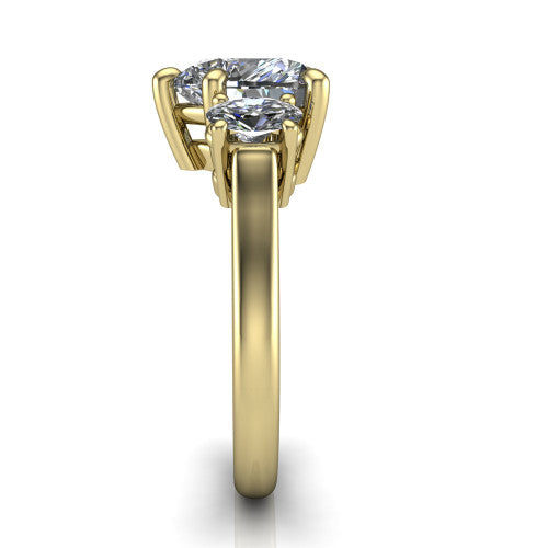 Imogen heart three stone engagement ring in 14K Yellow Gold, side profile showing the round side stone and the smooth tapered polished band