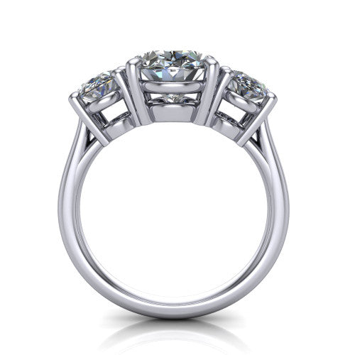 Imogen oval three stone engagement ring in 18K White Gold, through-finger front profile showing the three-stone head raised above the slim polished shank and trellis gallery