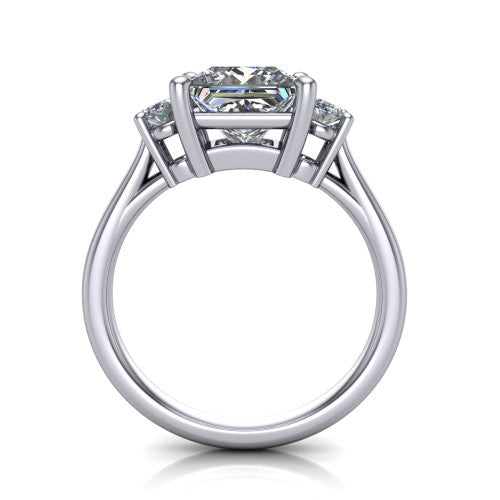 Imogen princess three stone engagement ring in 18K White Gold, through-finger front profile showing the three-stone head raised above the slim polished shank and trellis gallery