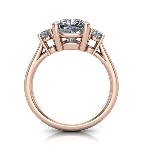 Imogen cushion three stone engagement ring in 14K Rose Gold, through-finger front profile showing the three-stone head raised above the slim polished shank and trellis gallery