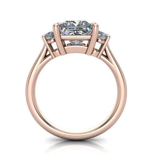Imogen princess three stone engagement ring in 14K Rose Gold, through-finger front profile showing the three-stone head raised above the slim polished shank and trellis gallery