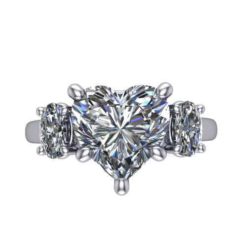 Imogen heart three stone engagement ring in 14K White Gold, top-down view showing the center diamond flanked by two round side stones in a classic three stone setting