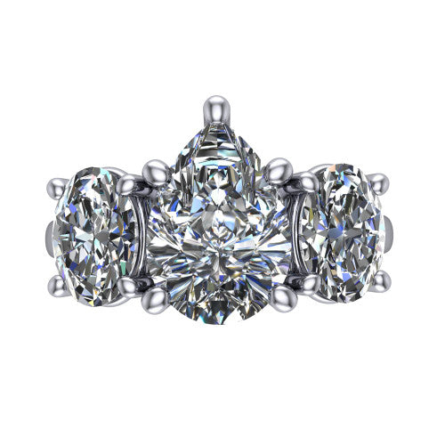 Imogen pear three stone engagement ring in 14K White Gold, top-down view showing the center diamond flanked by two round side stones in a classic three stone setting