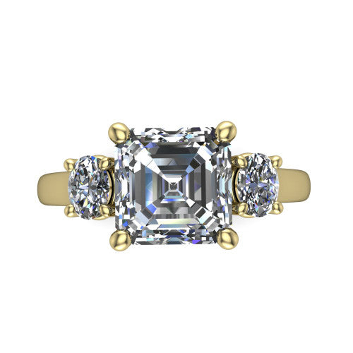 Imogen asscher three stone engagement ring in 14K Yellow Gold, top-down view showing the center diamond flanked by two round side stones in a classic three stone setting