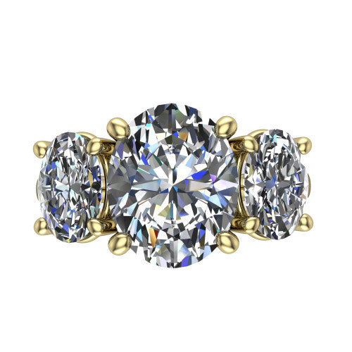 Imogen oval three stone engagement ring in 18K Yellow Gold, top-down view showing the center diamond flanked by two round side stones in a classic three stone setting