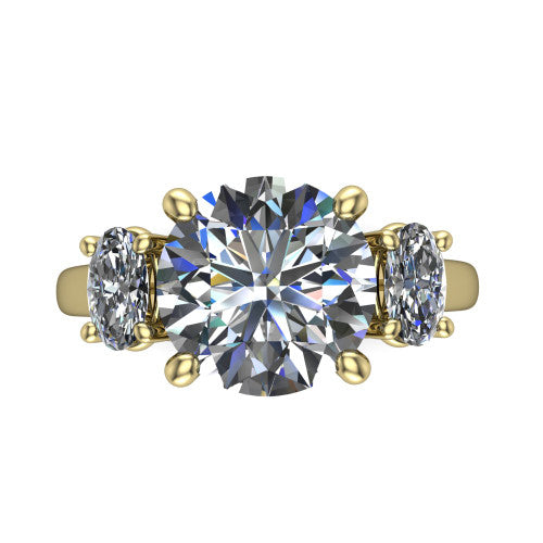 Imogen round three stone engagement ring in 18K Yellow Gold, top-down view showing the center diamond flanked by two round side stones in a classic three stone setting