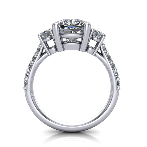 Poppy cushion three stone engagement ring in Platinum, through-finger front profile showing the three-stone head raised above the pav&eacute; band
