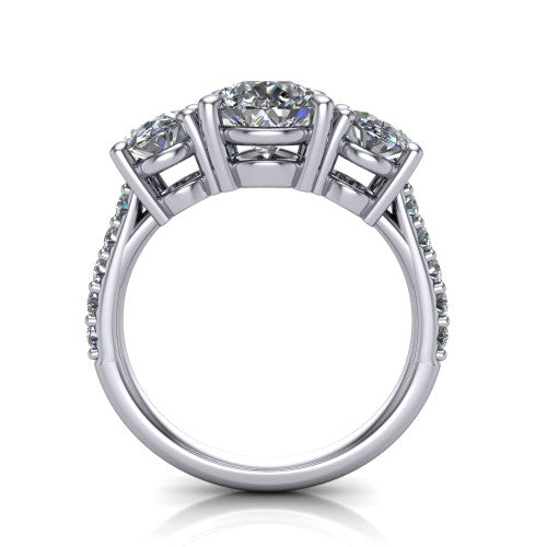Poppy pear three stone engagement ring in Platinum, through-finger front profile showing the three-stone head raised above the pav&eacute; band
