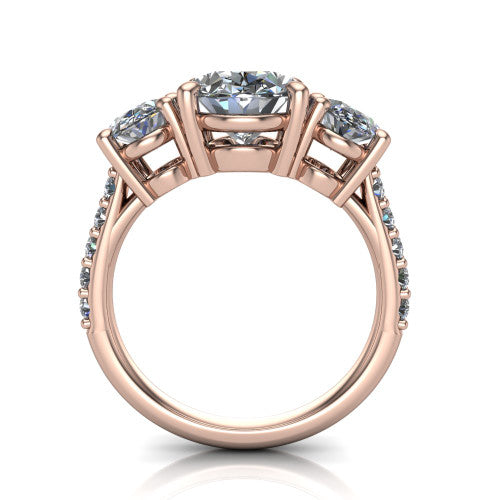 Poppy oval three stone engagement ring in 14K Rose Gold, through-finger front profile showing the three-stone head raised above the pav&eacute; band