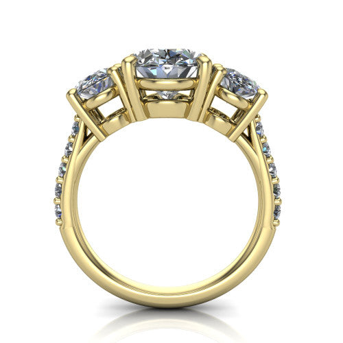 Poppy oval three stone engagement ring in 18K Yellow Gold, through-finger front profile showing the three-stone head raised above the pav&eacute; band