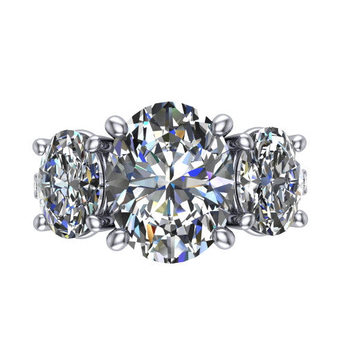Poppy oval three stone engagement ring in 14K White Gold, top-down view showing the center diamond flanked by two round side stones in a classic three stone setting