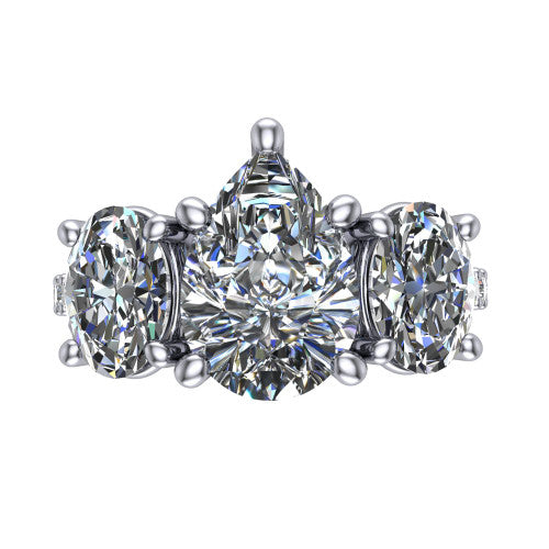 Poppy pear three stone engagement ring in 14K White Gold, top-down view showing the center diamond flanked by two round side stones in a classic three stone setting