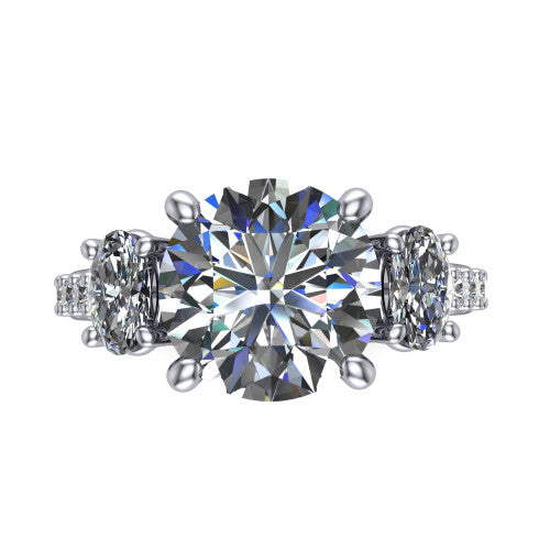 Poppy round three stone engagement ring in Platinum, top-down view showing the center diamond flanked by two round side stones in a classic three stone setting