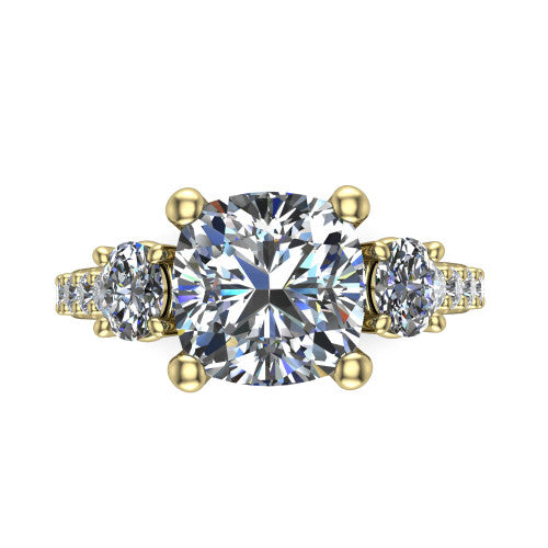 Poppy cushion three stone engagement ring in 14K Yellow Gold, top-down view showing the center diamond flanked by two round side stones in a classic three stone setting