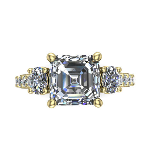 Poppy asscher three stone engagement ring in 18K Yellow Gold, top-down view showing the center diamond flanked by two round side stones in a classic three stone setting