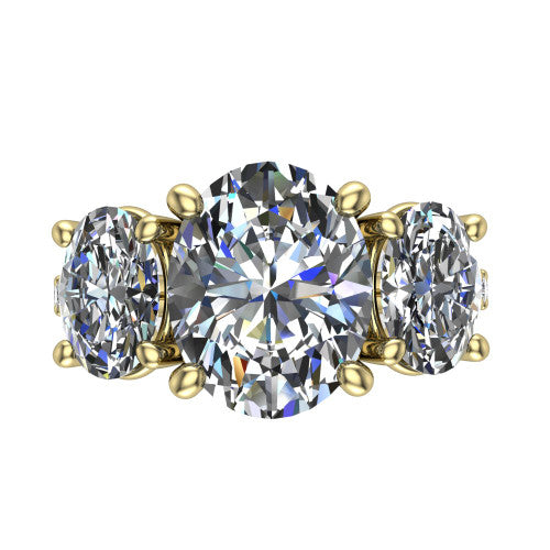 Poppy oval three stone engagement ring in 14K Yellow Gold, top-down view showing the center diamond flanked by two round side stones in a classic three stone setting