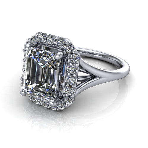 Seraphina emerald halo engagement ring in 18K White Gold, three-quarter perspective showing the haloed center raised above a pav&eacute; split shank