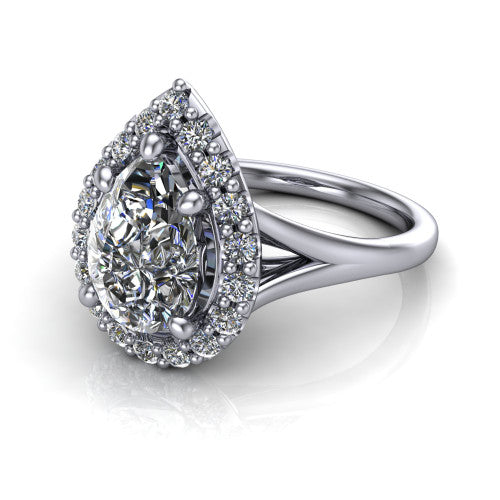 Seraphina pear halo engagement ring in 18K White Gold, three-quarter perspective showing the haloed center raised above a pav&eacute; split shank