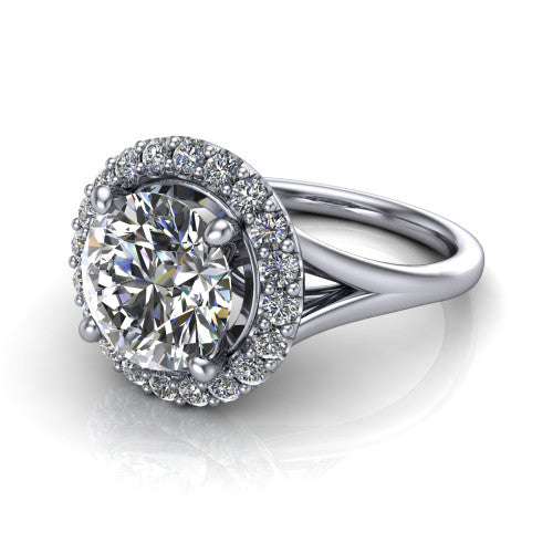 Seraphina round halo engagement ring in Platinum, three-quarter perspective showing the haloed center raised above a pav&eacute; split shank