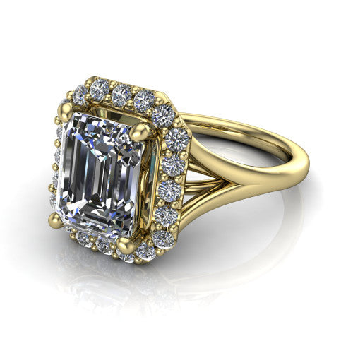 Seraphina emerald halo engagement ring in 18K Yellow Gold, three-quarter perspective showing the haloed center raised above a pav&eacute; split shank