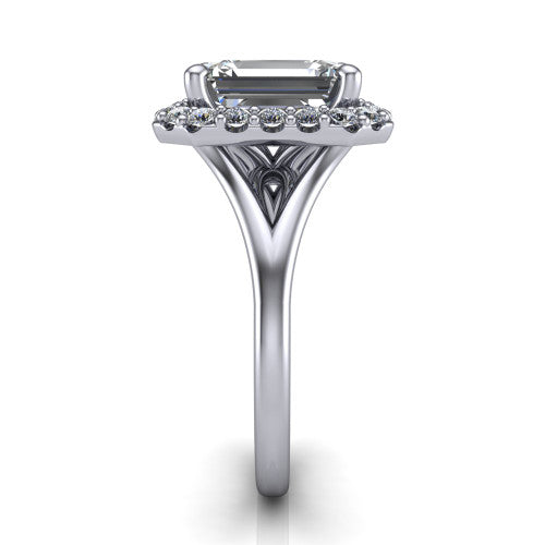Seraphina emerald halo engagement ring in Platinum, side profile showing the pav&eacute; split shank dividing into two diamond-lined rails beneath the halo