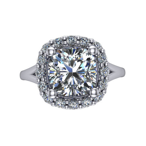 Seraphina cushion halo engagement ring in 18K White Gold, top-down view showing the center diamond framed by a pav&eacute; halo where the split shank meets the head