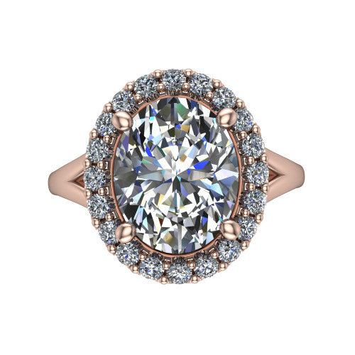 Seraphina oval halo engagement ring in 18K Rose Gold, top-down view showing the center diamond framed by a pav&eacute; halo where the split shank meets the head