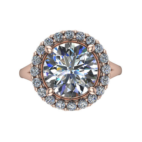 Seraphina round halo engagement ring in 18K Rose Gold, top-down view showing the center diamond framed by a pav&eacute; halo where the split shank meets the head